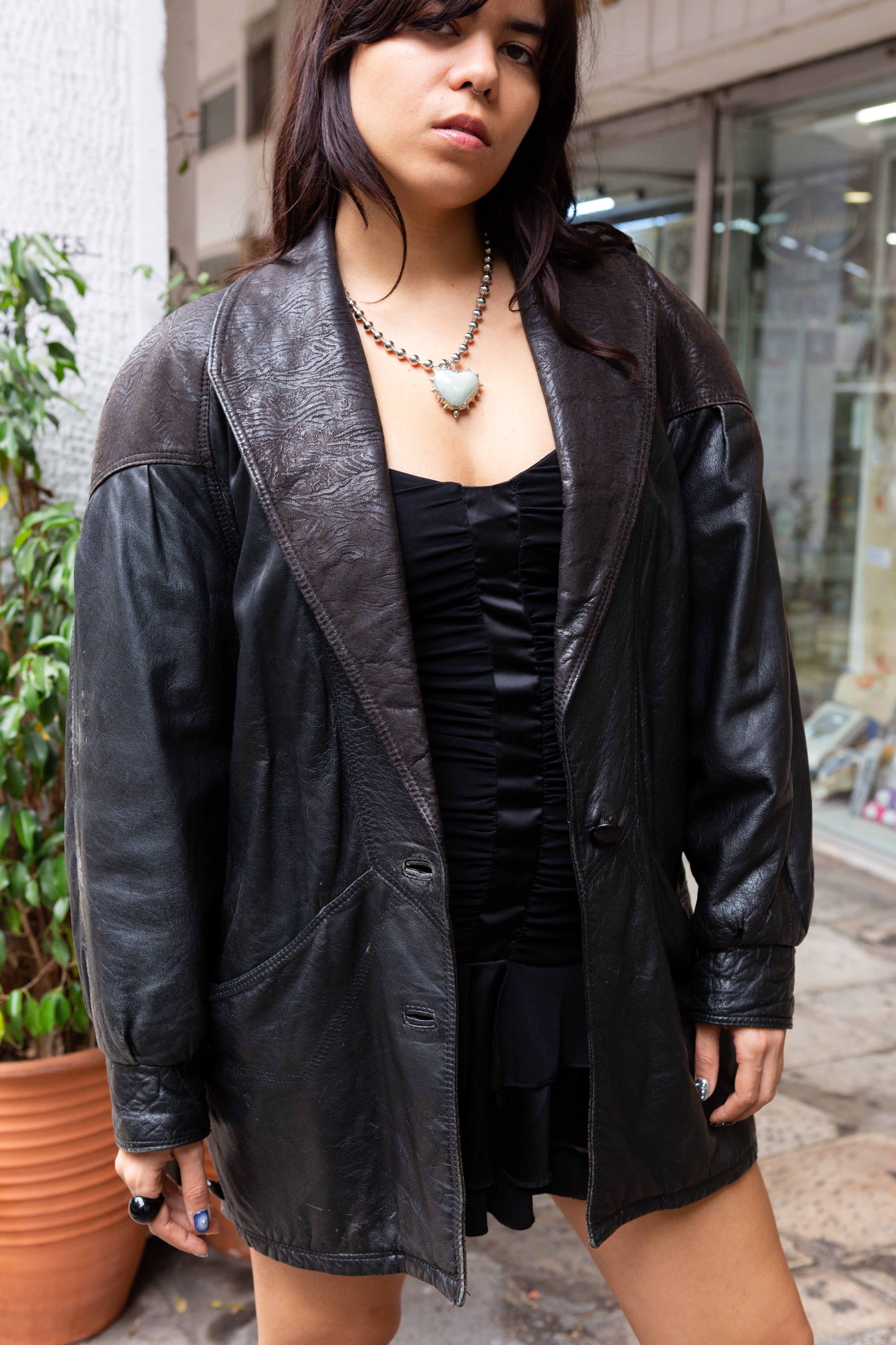 Stunning 80s leather jacket with patterned leather details and shoulder pads