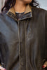 Super cool distressed brown leather jacket with knitted details (L)
