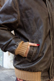 Super cool distressed brown leather jacket with knitted details (L)