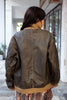 Super cool distressed brown leather jacket with knitted details (L)