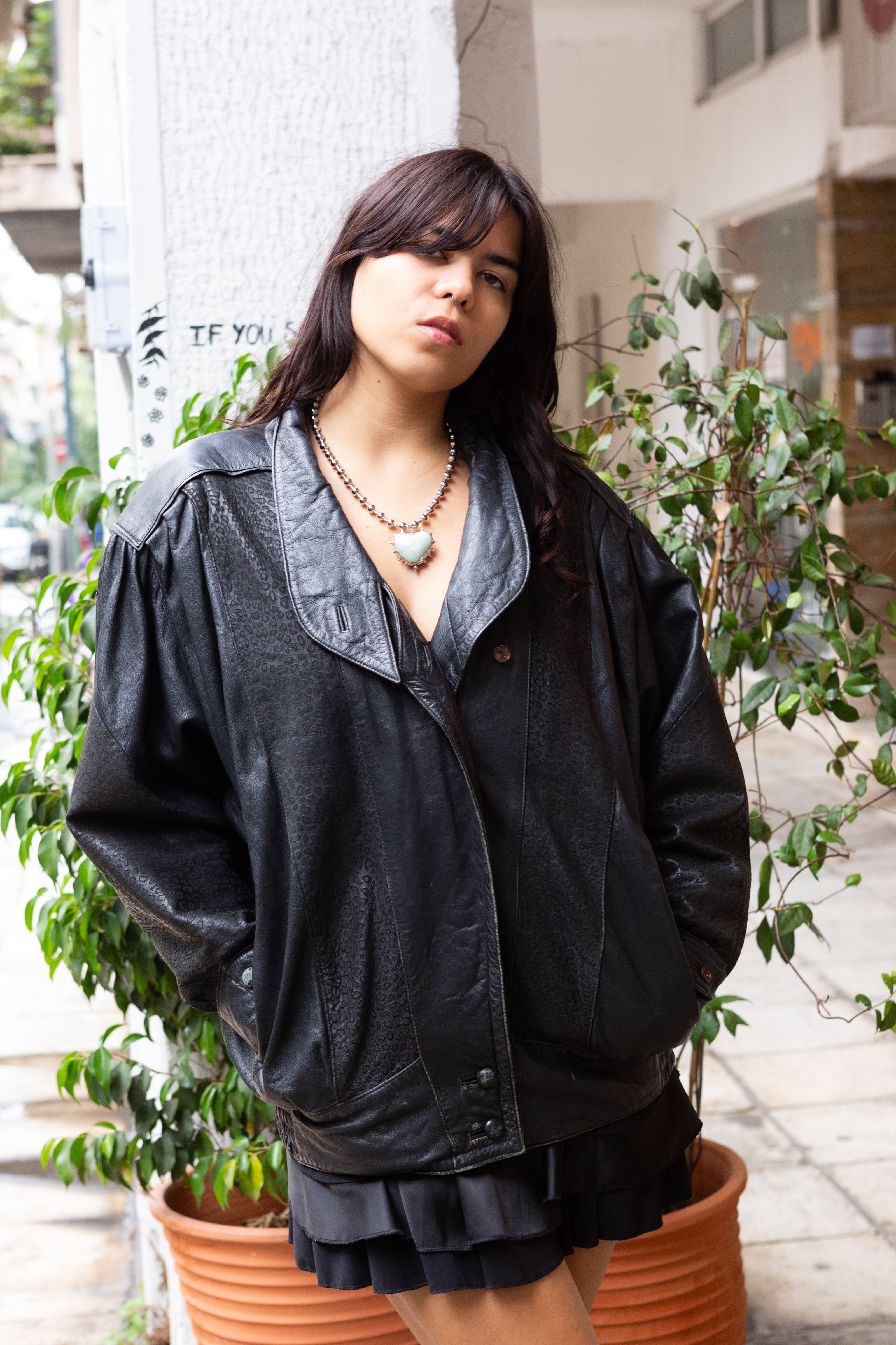 Vintage 80s genuine leather jacket with patterned leather details and shoulder pads