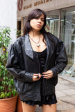 Vintage 80s genuine leather jacket with patterned leather details and shoulder pads