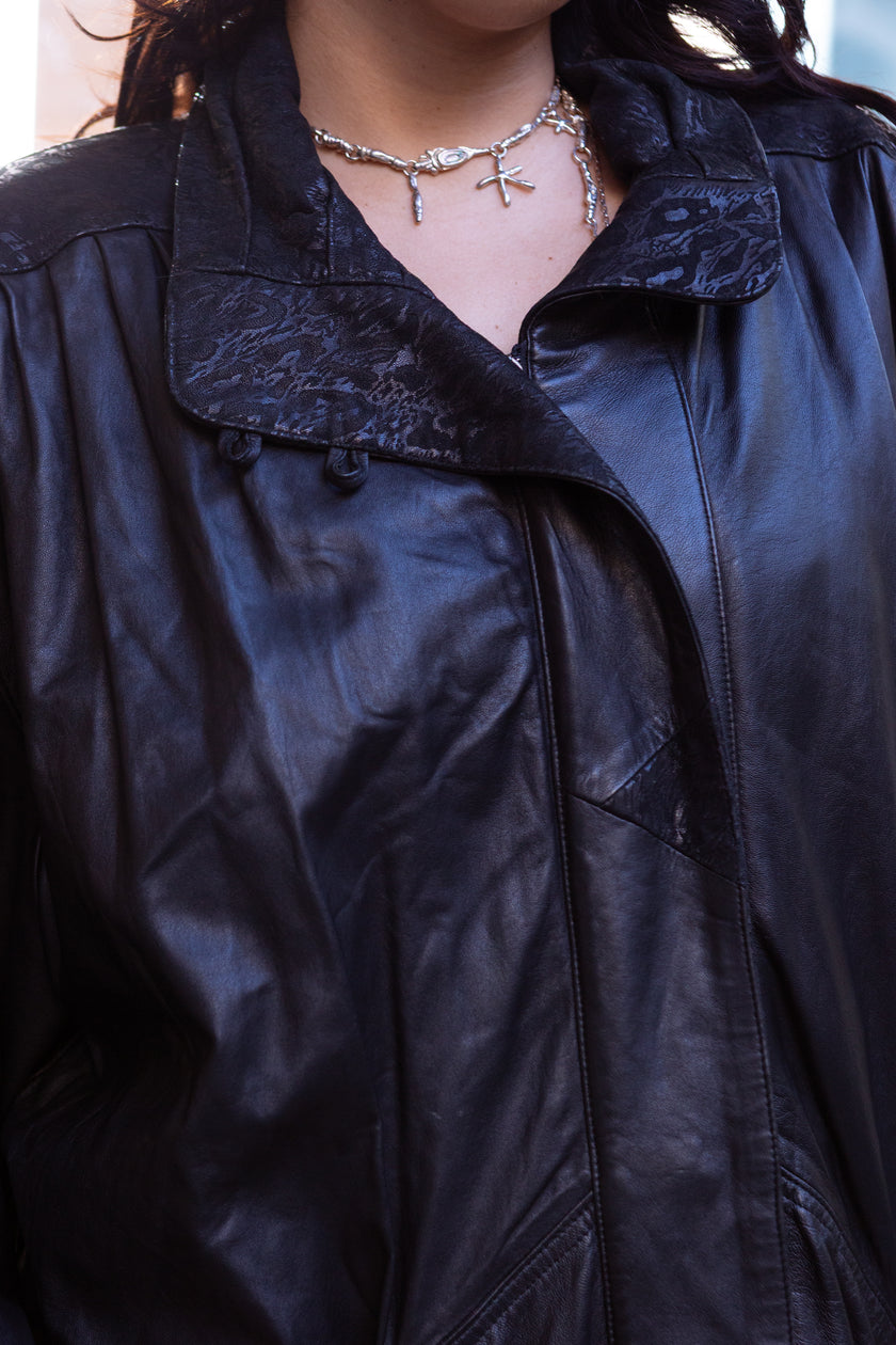 Super hot black leather jacket with animal-print details (L)