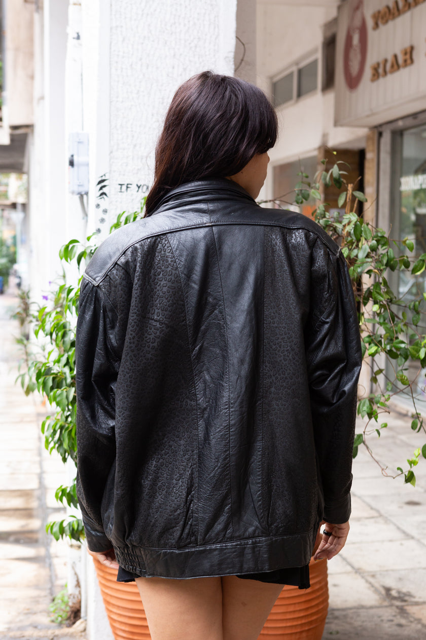Vintage 80s genuine leather jacket with patterned leather details and shoulder pads