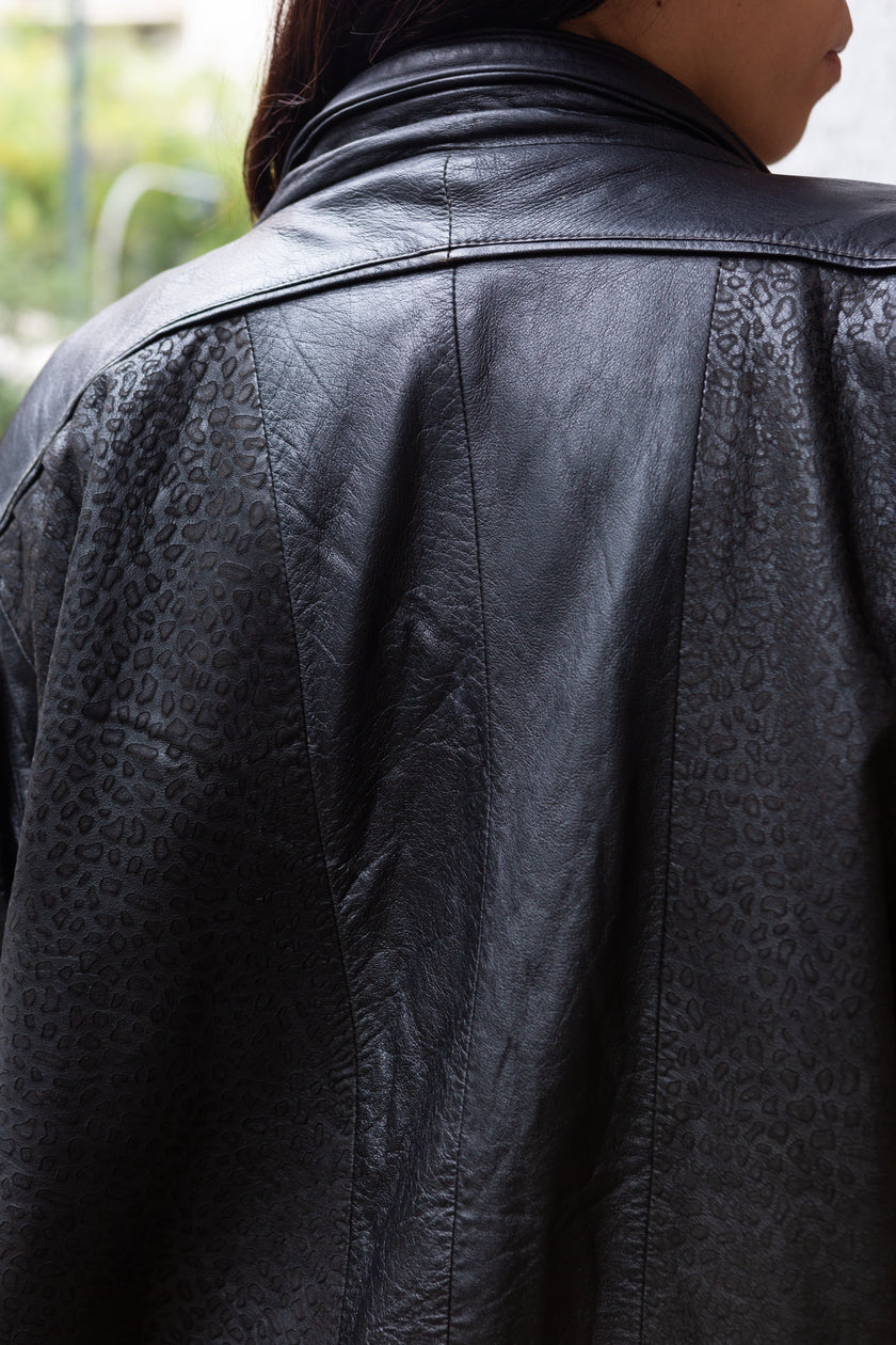 Vintage 80s genuine leather jacket with patterned leather details and shoulder pads