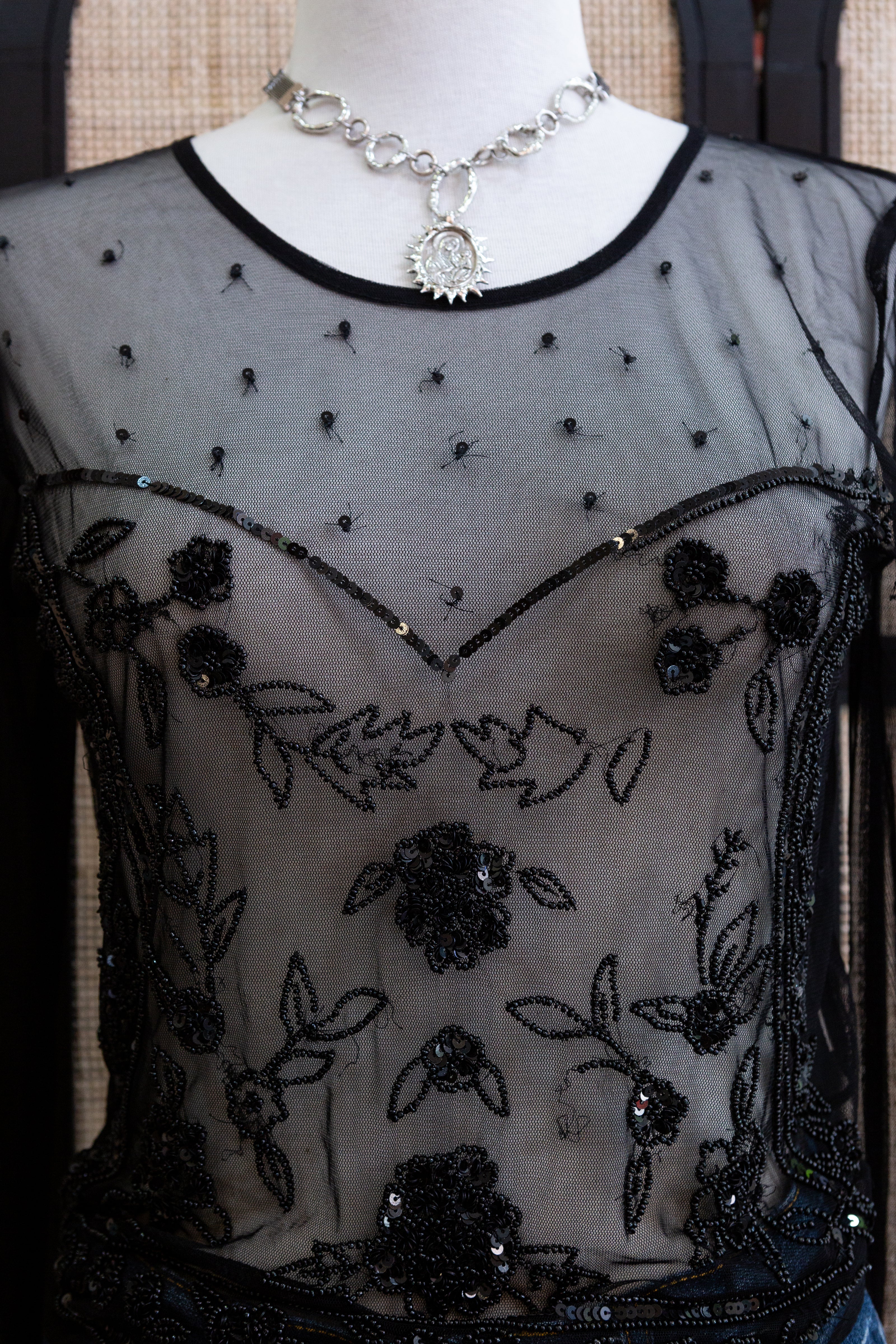 Stunning mesh top with sequin and beading detailing