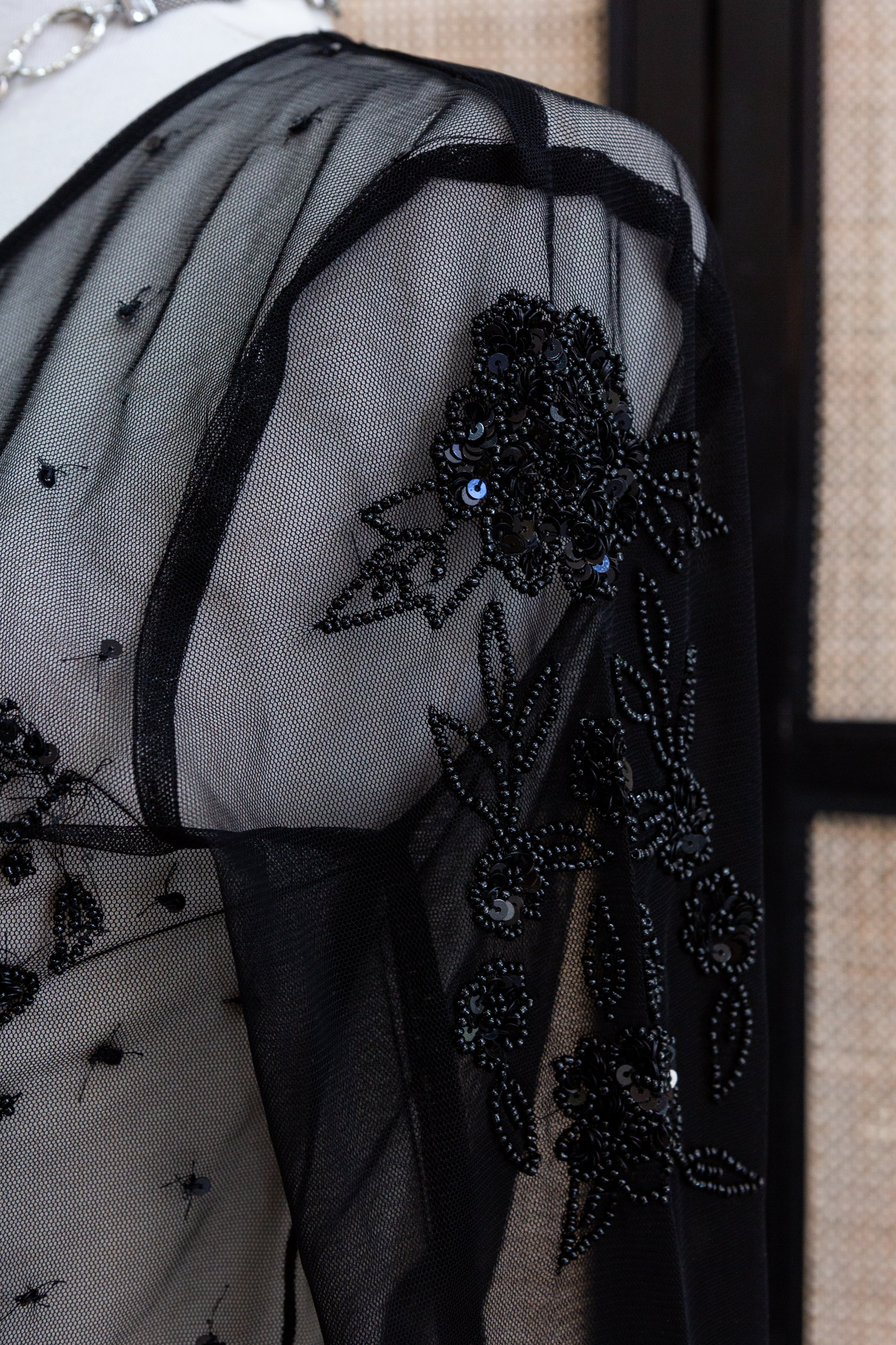 Stunning mesh top with sequin and beading detailing