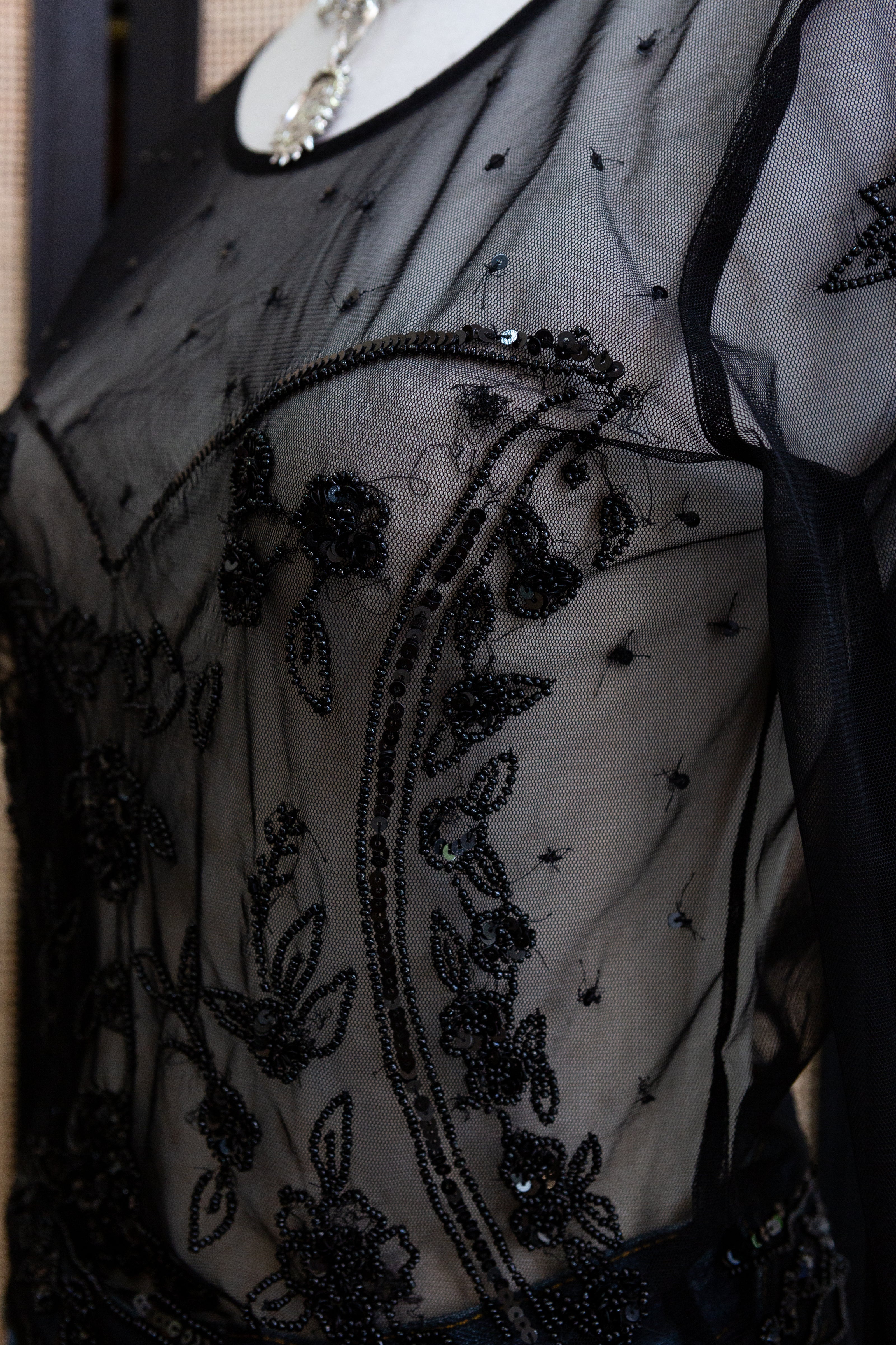 Stunning mesh top with sequin and beading detailing