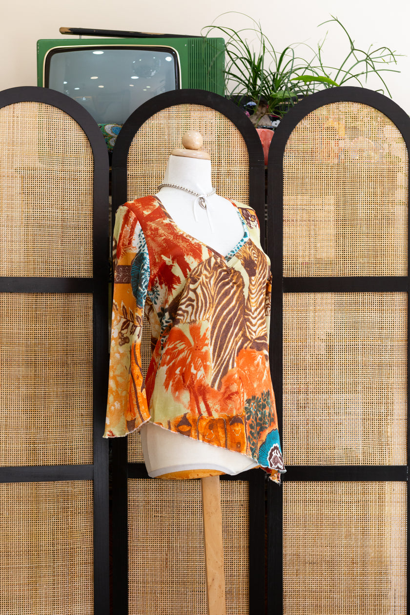 Stunning Vintage asymetrical mesh top