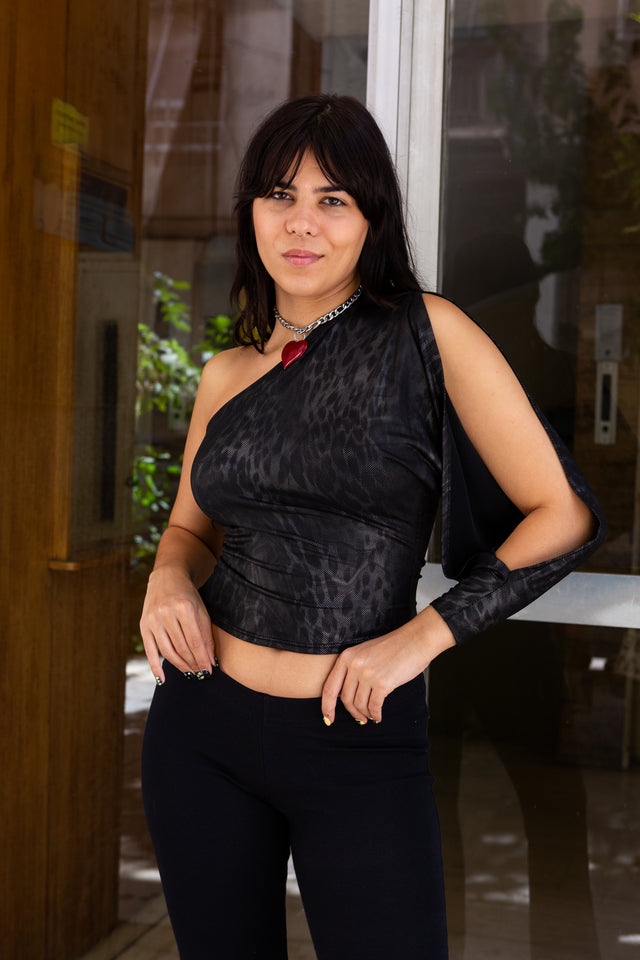 Absolutely stunning deadstock Y2K one shoulder top with sexy cutout on the sleeve