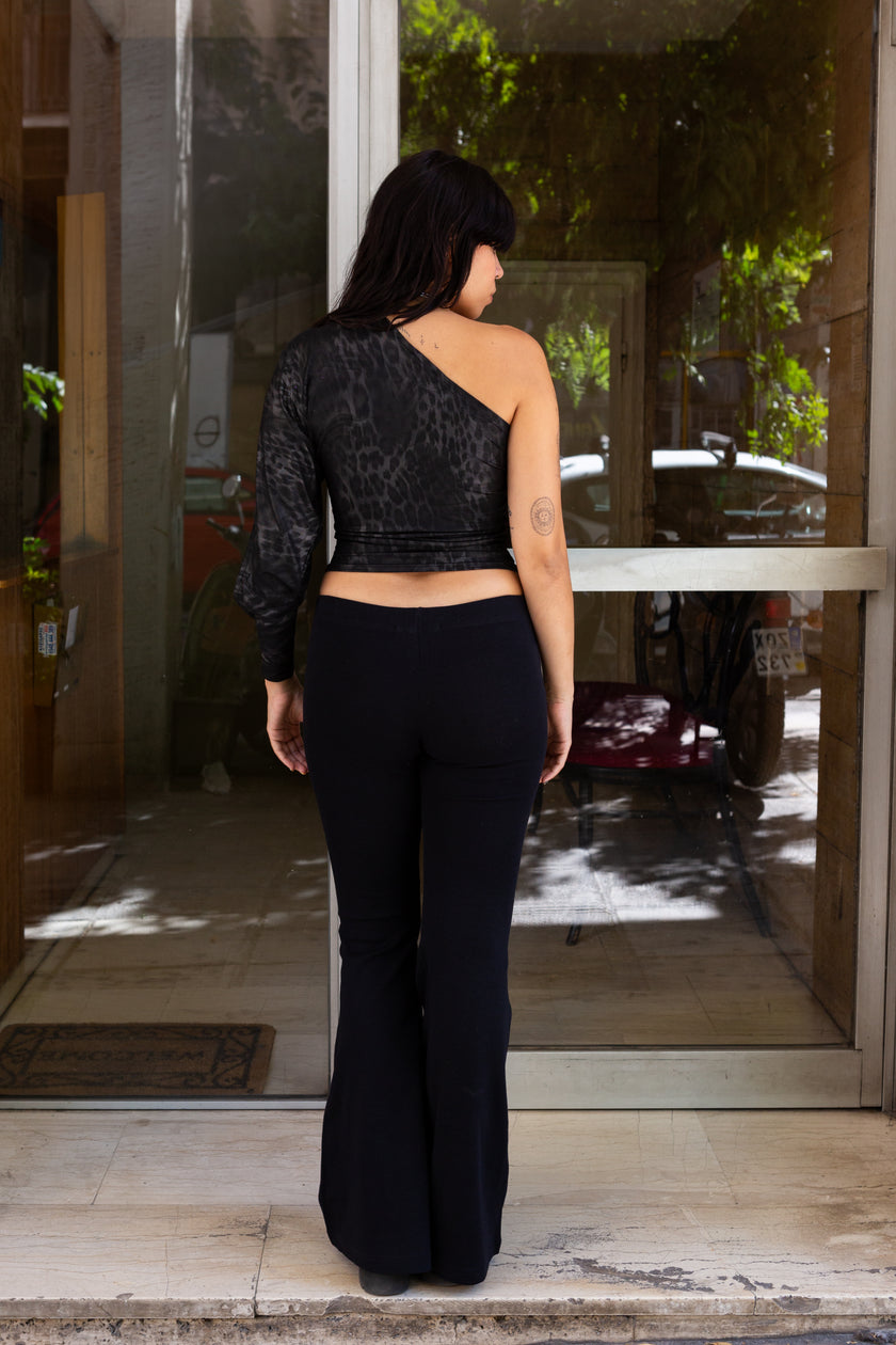 Absolutely stunning deadstock Y2K one shoulder top with sexy cutout on the sleeve