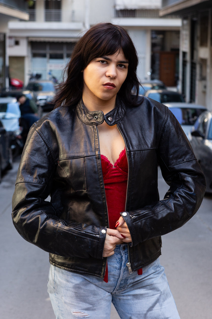 Woman’s vintage black leather jacket (M)