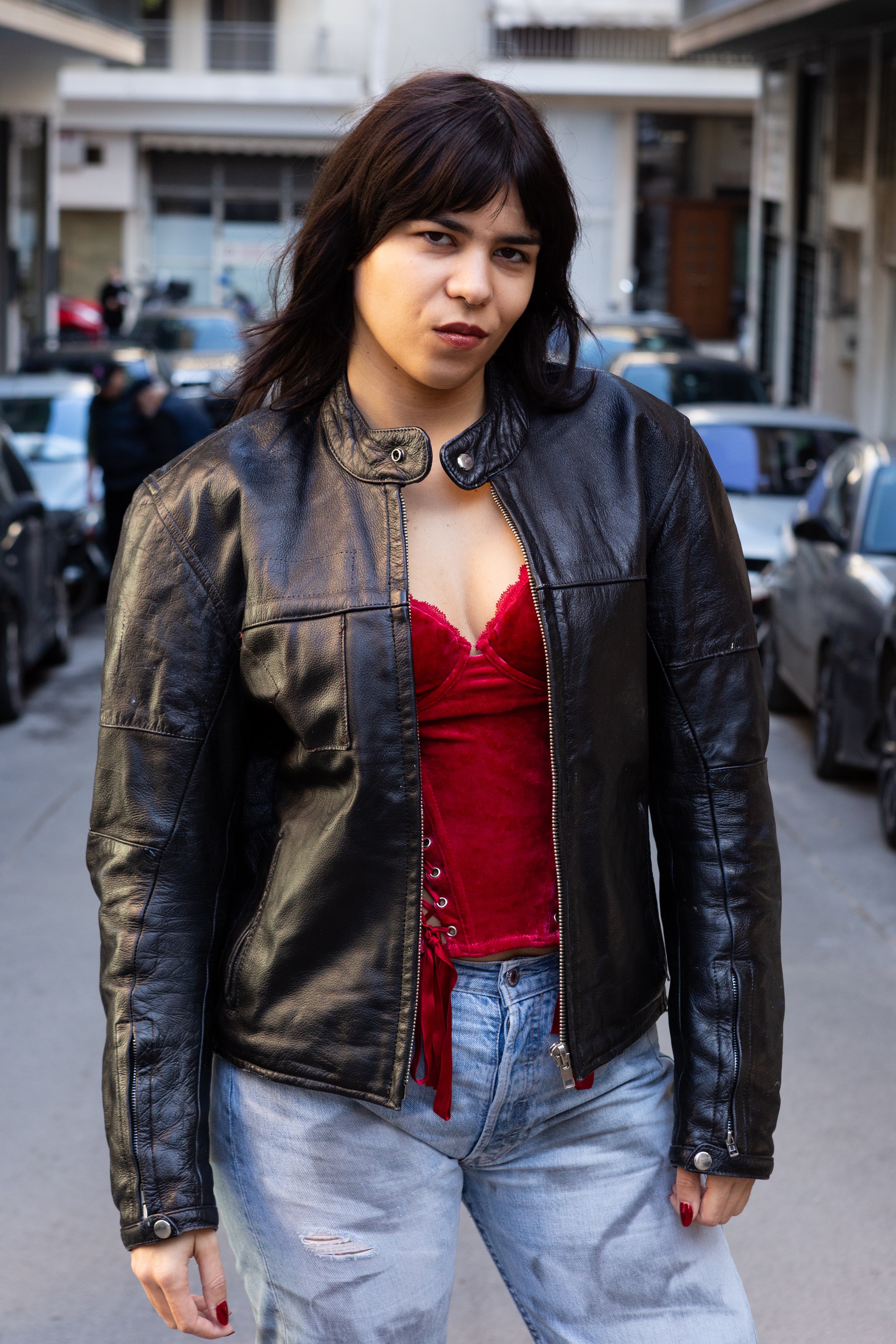 Woman’s vintage black leather jacket (M)