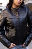 Woman’s vintage black leather jacket (M)