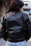 Woman’s vintage black leather jacket (M)