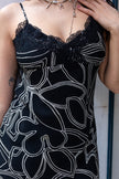 Very pretty black and white with lace detailing (M)