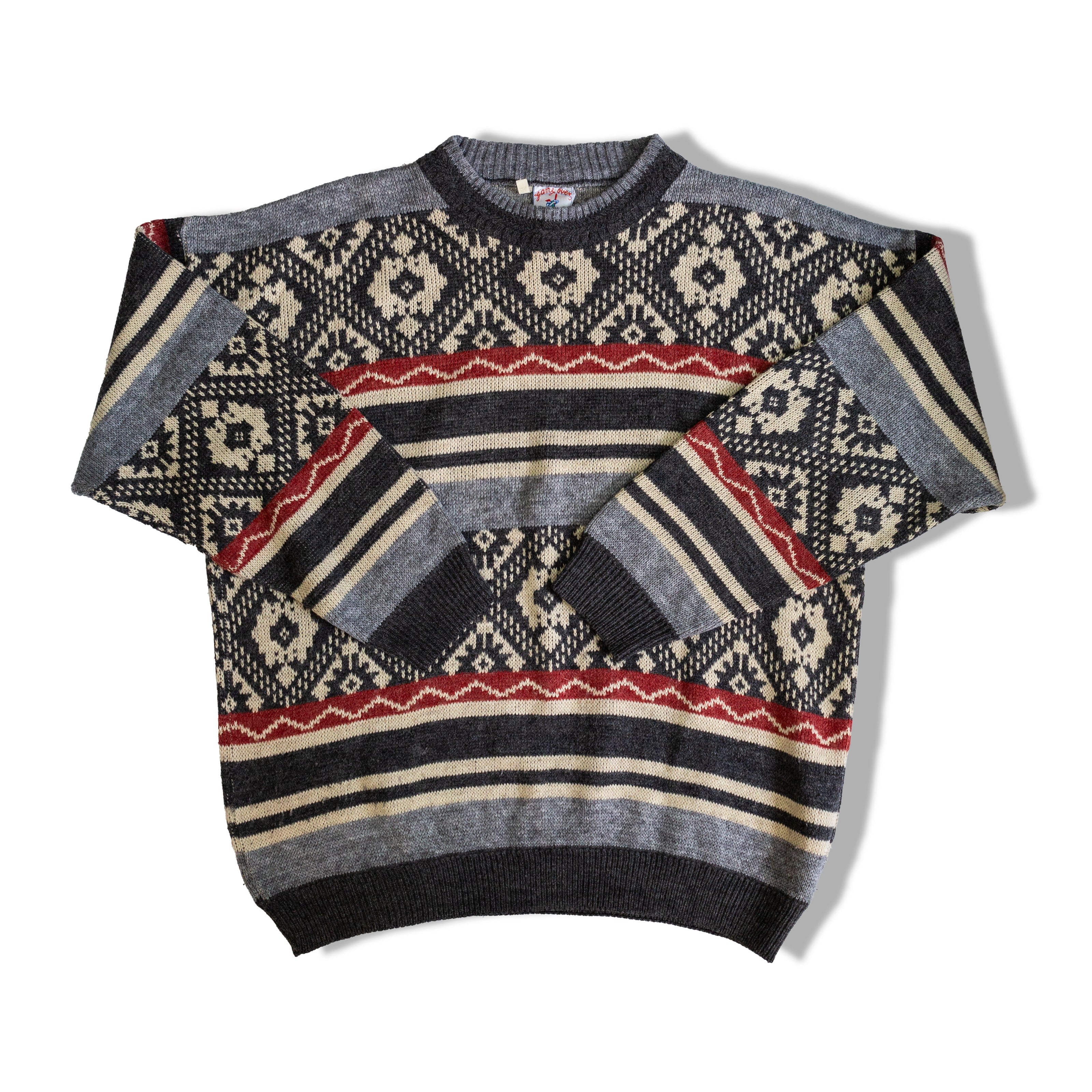 Fun knitted sweater with multiple patterns