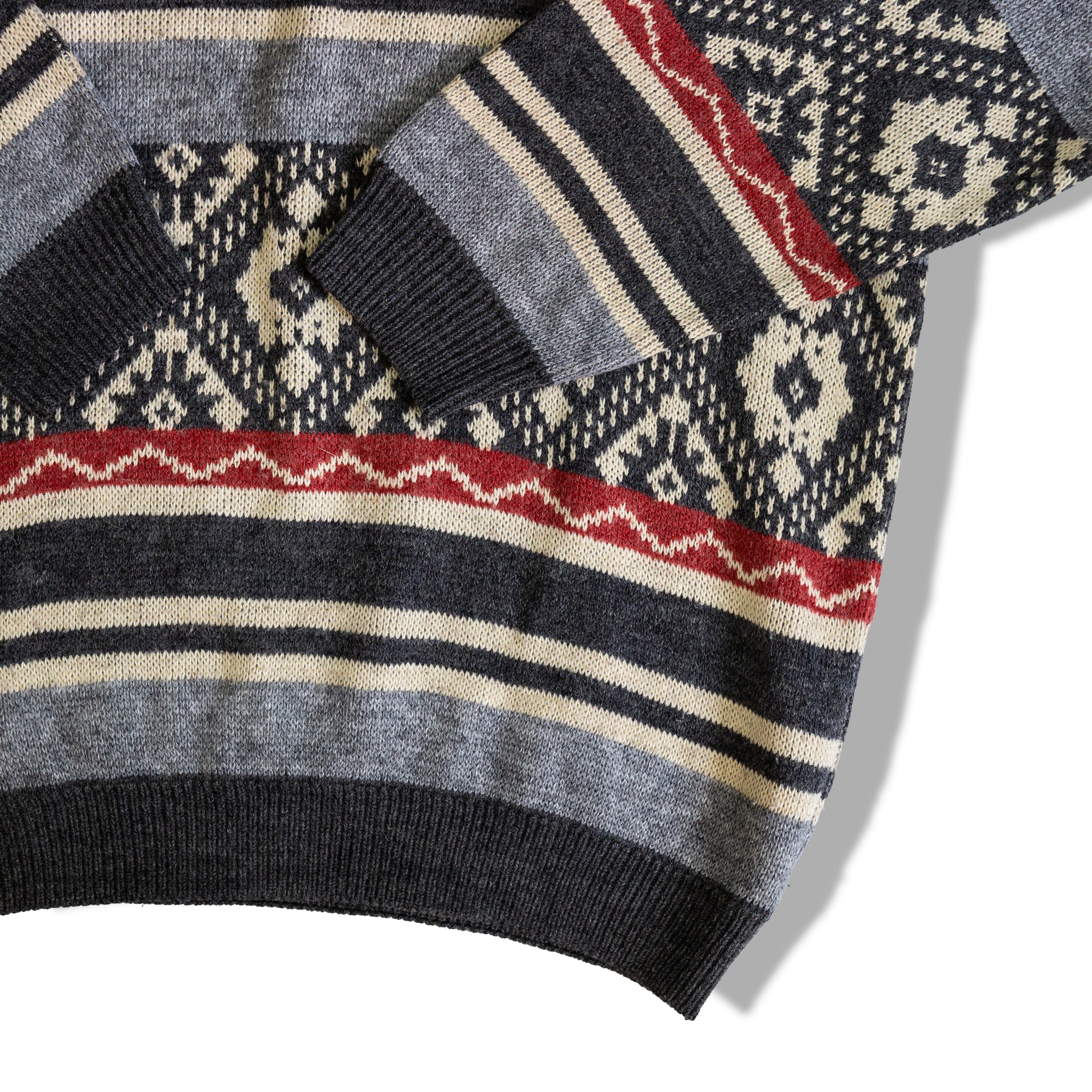 Fun knitted sweater with multiple patterns