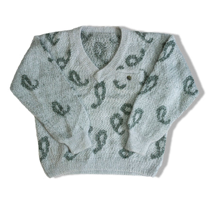 Super cute knit sweater with a little pocket