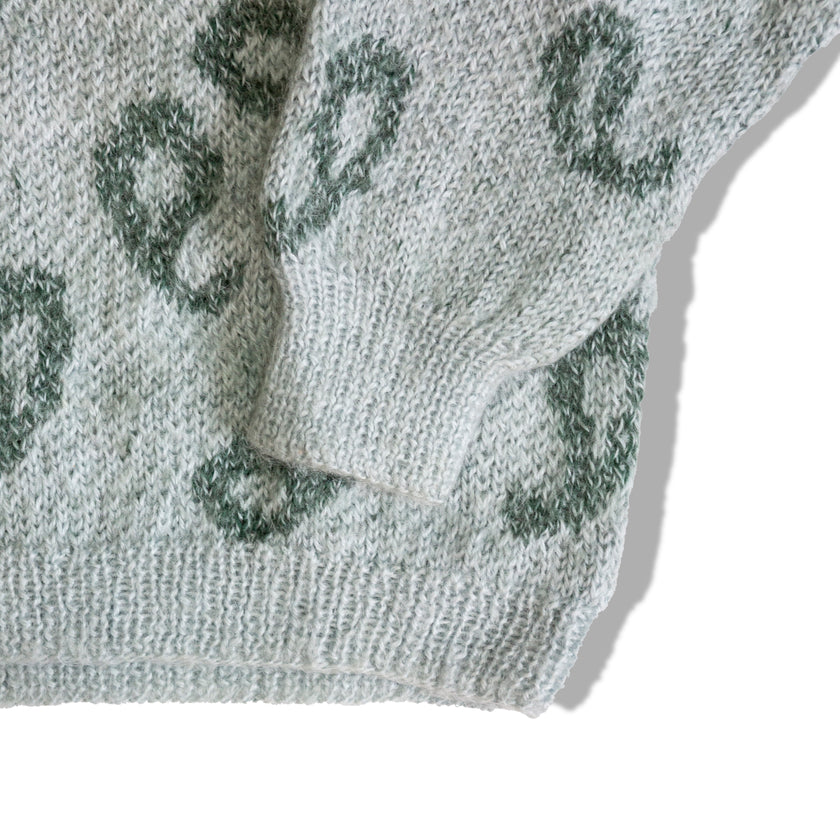 Super cute knit sweater with a little pocket