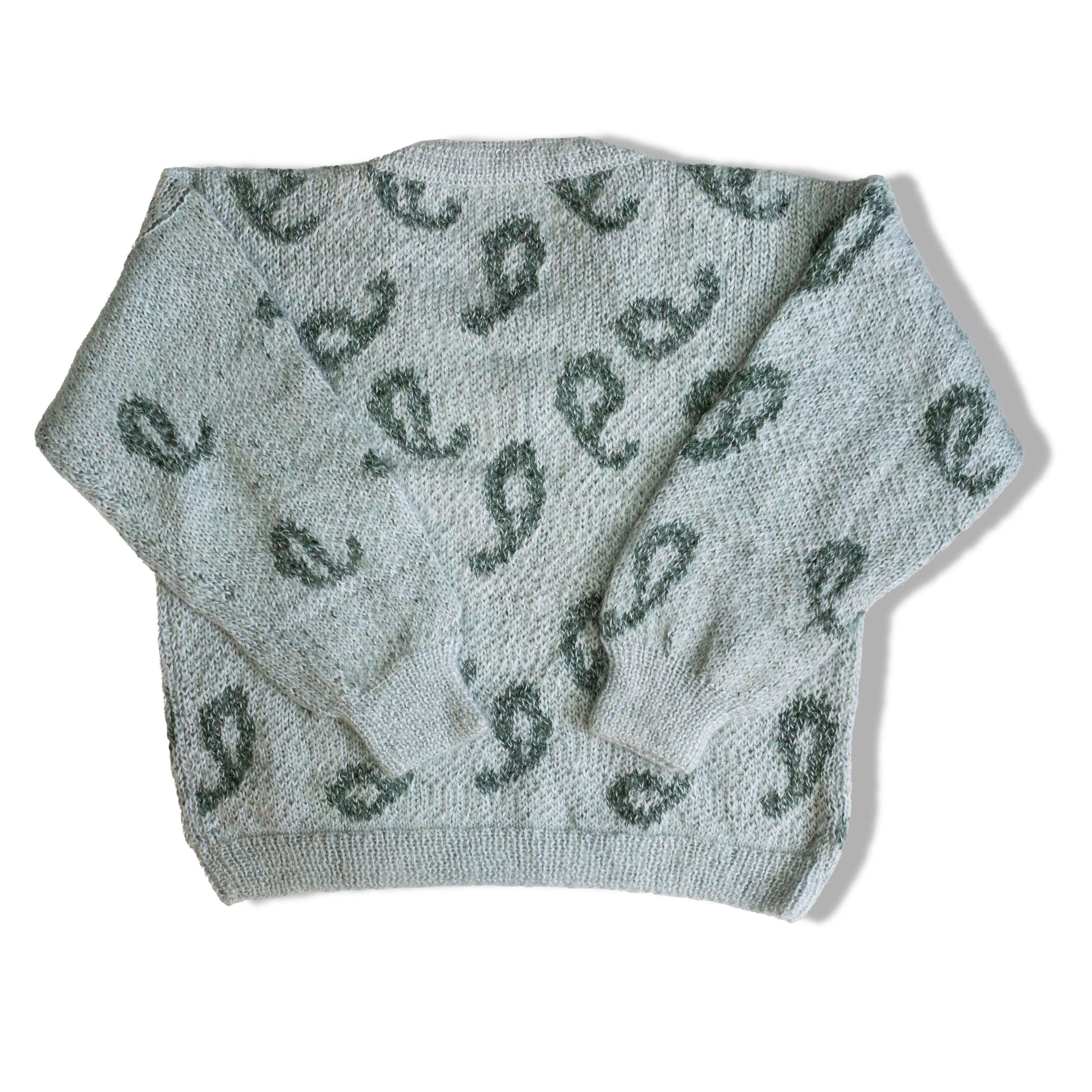 Super cute knit sweater with a little pocket