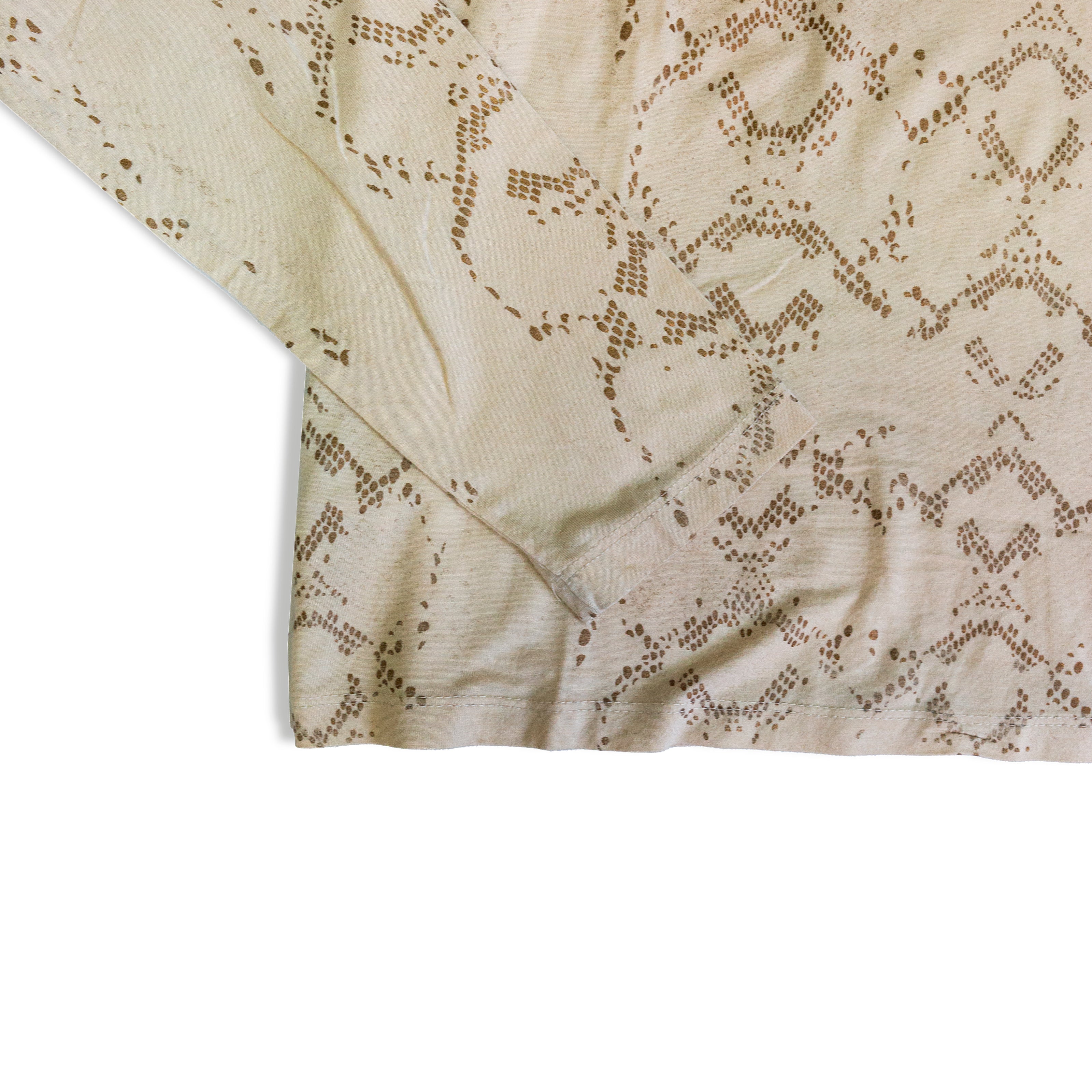 Beige top with delicate leopard accents