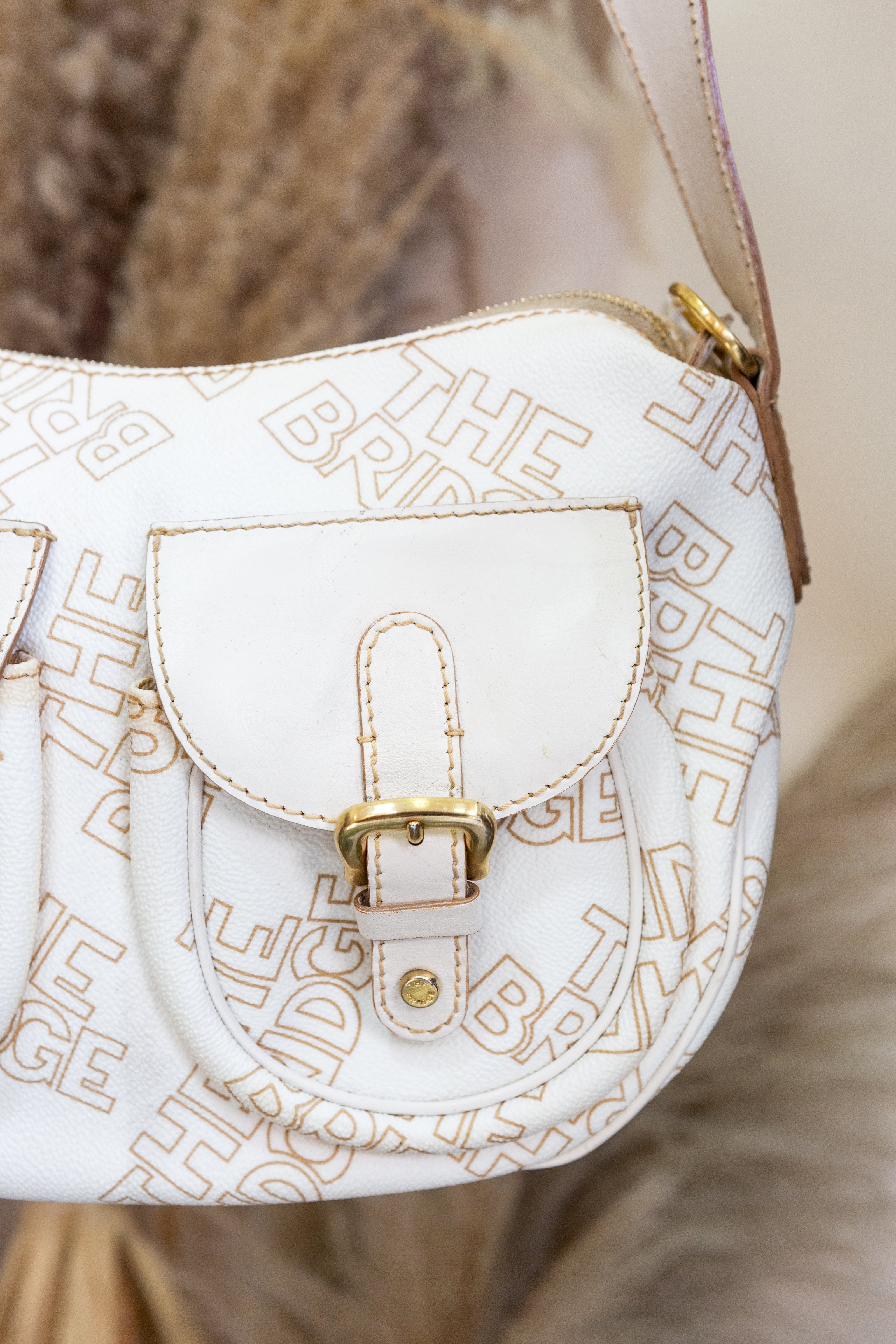The Bridge White Monogram Shoulder Bag with Dual Front Pockets