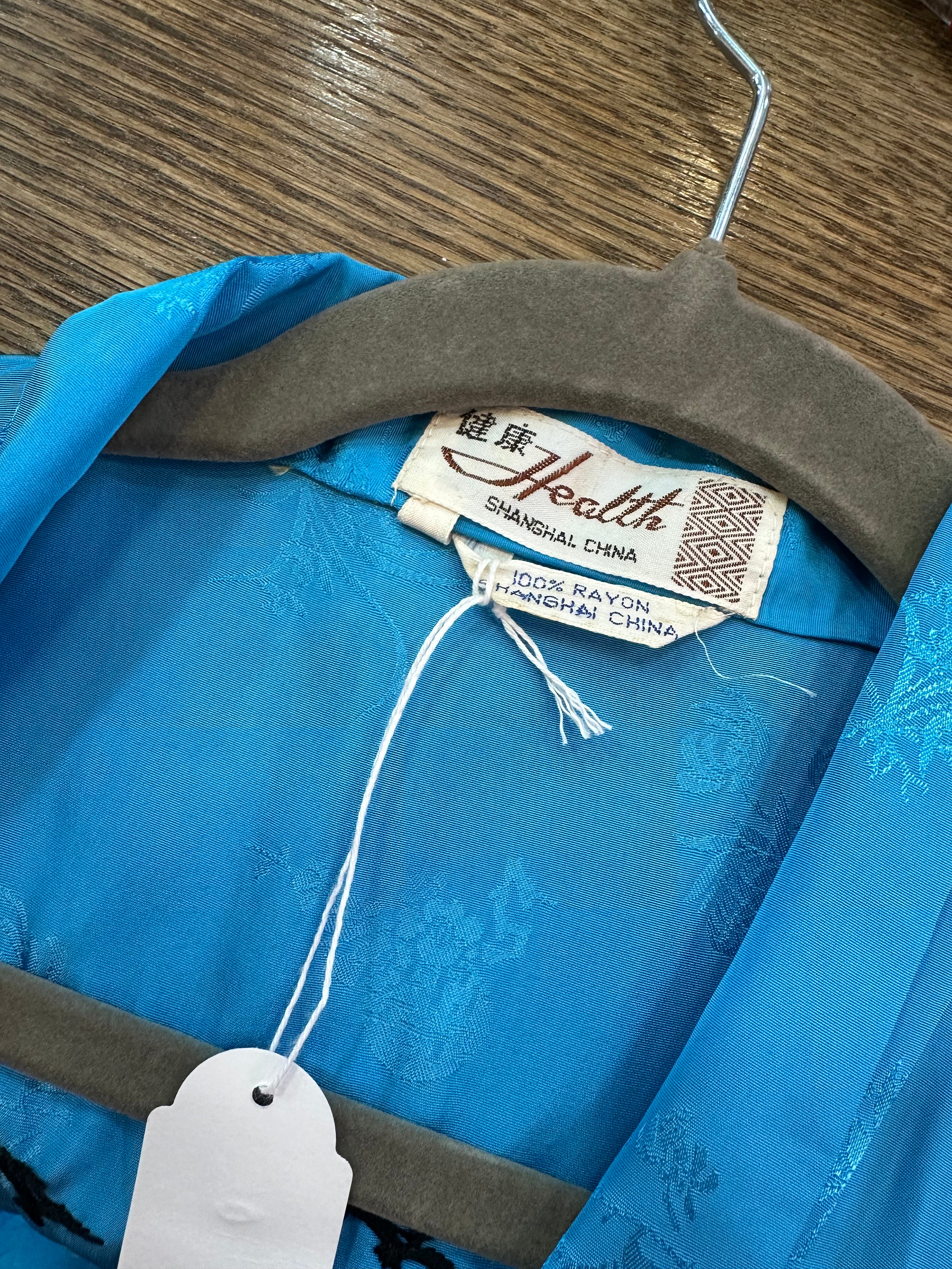 Beautiful 100% rayon chinese rode with embroidery detailing