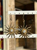 Gold toned brass sun earrings