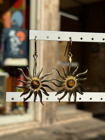 Gold toned brass sun earrings