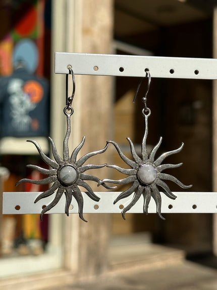 Silver toned brass sun earrings