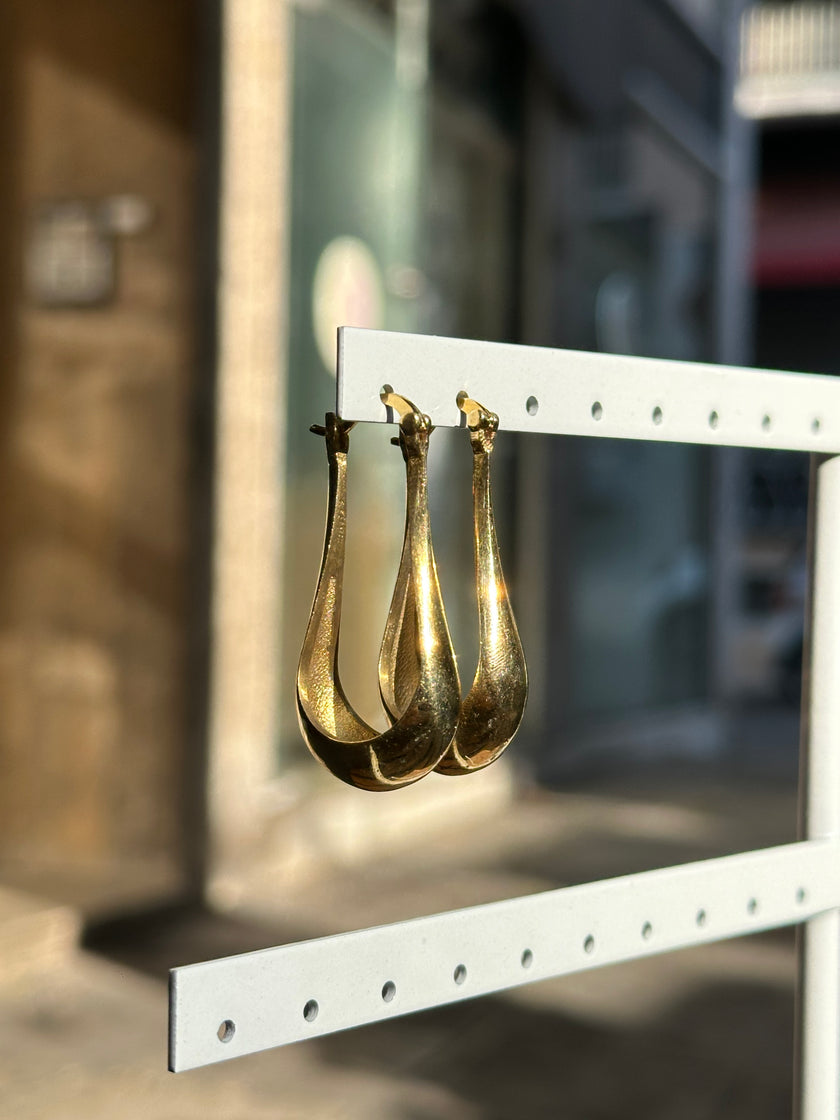 Gold toned brass earrings