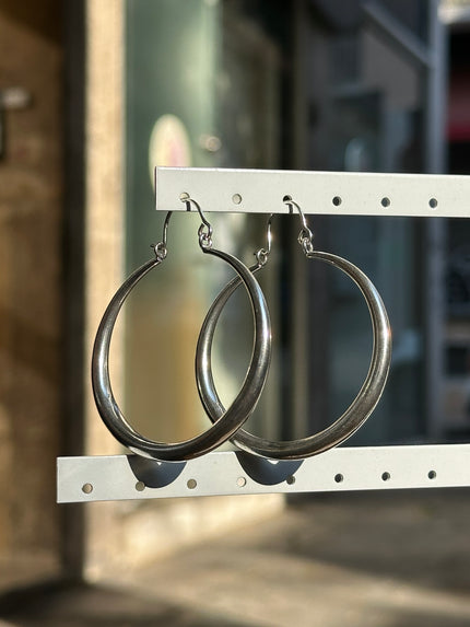 Silver toned brass hoop earrings