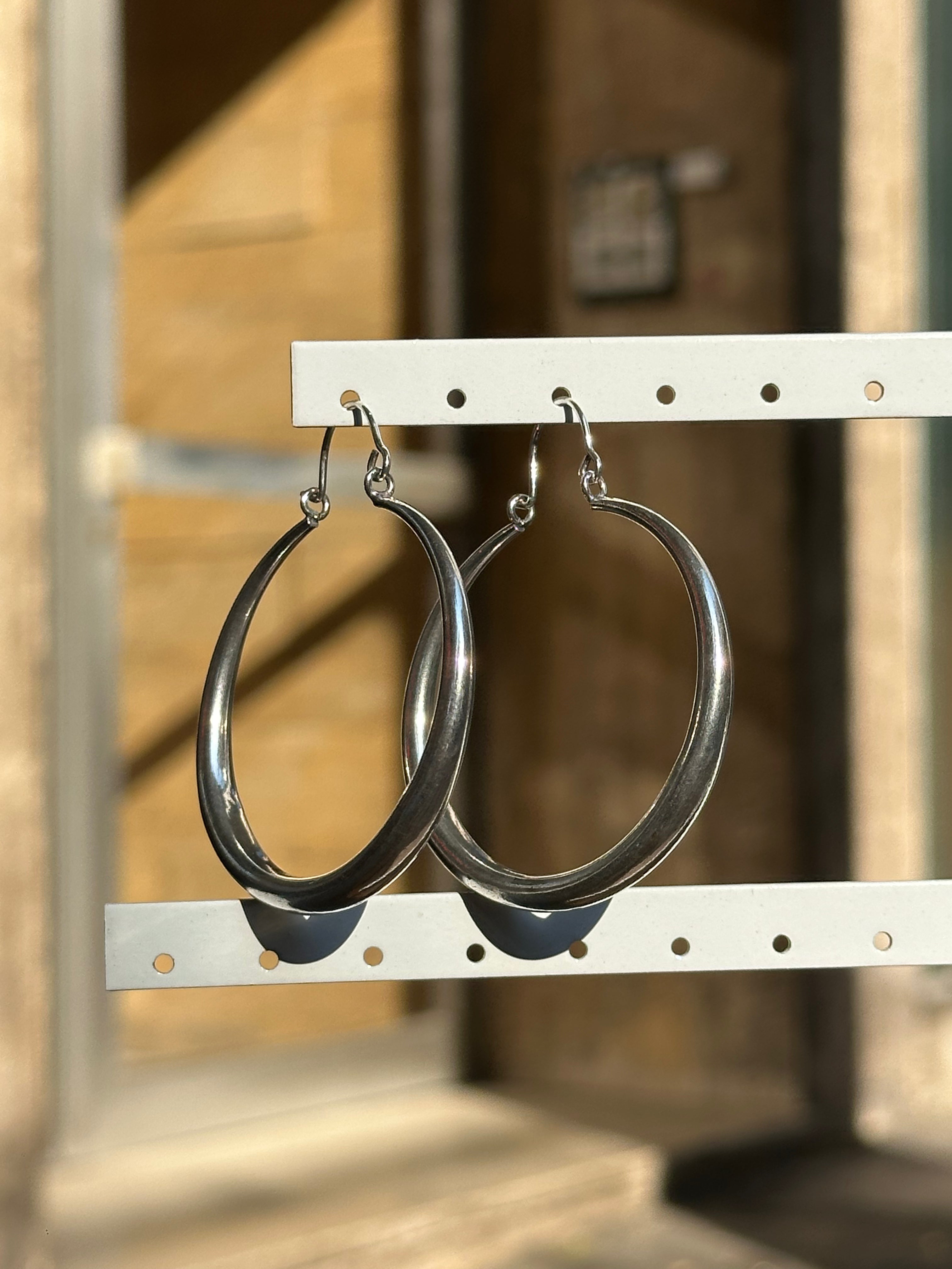 Silver toned brass hoop earrings