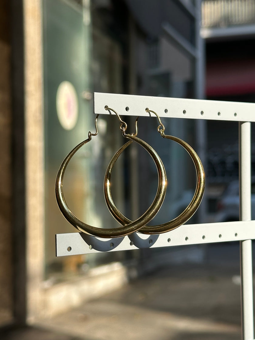 Gold toned brass hoop earrings