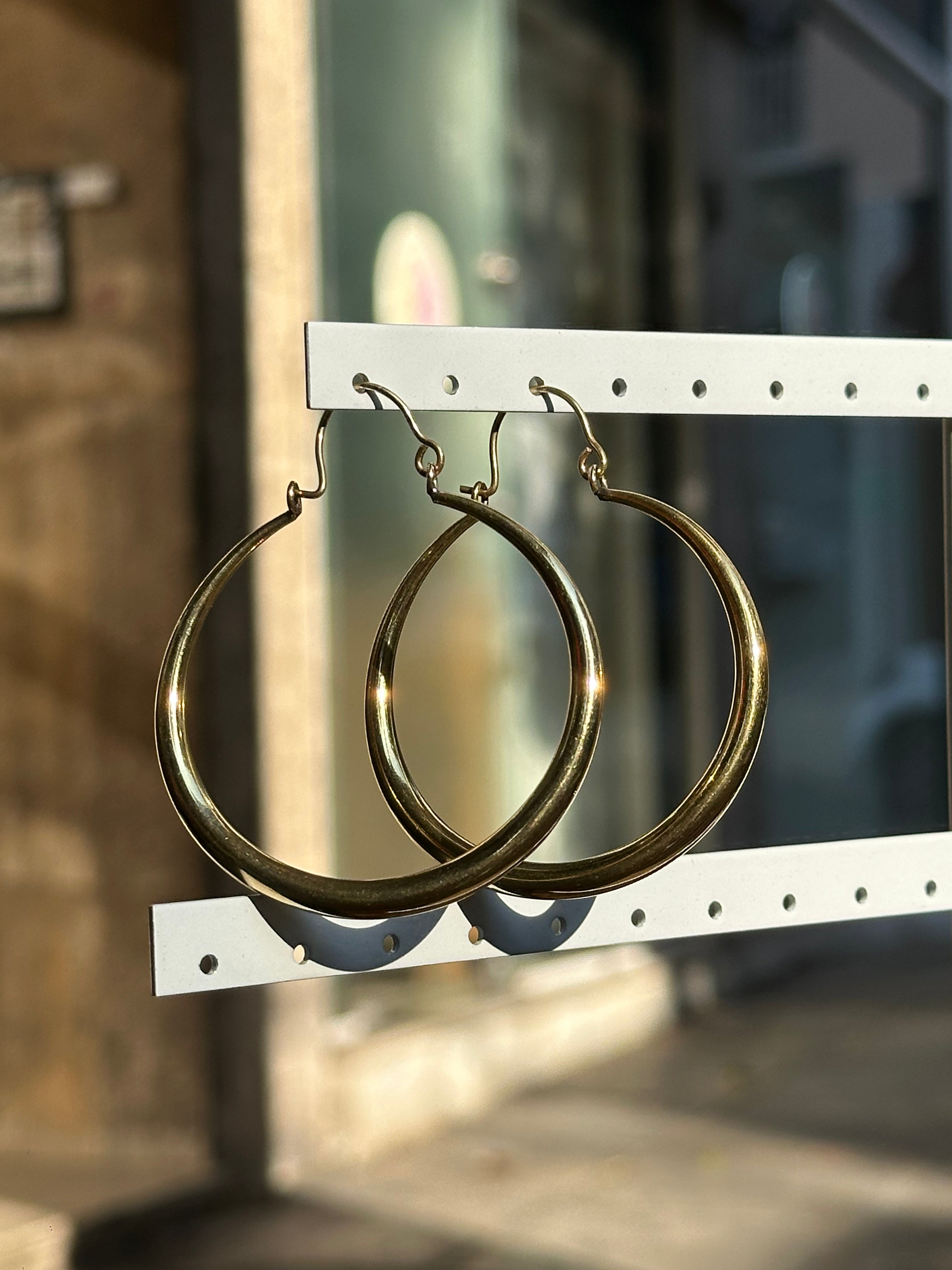 Gold toned brass hoop earrings