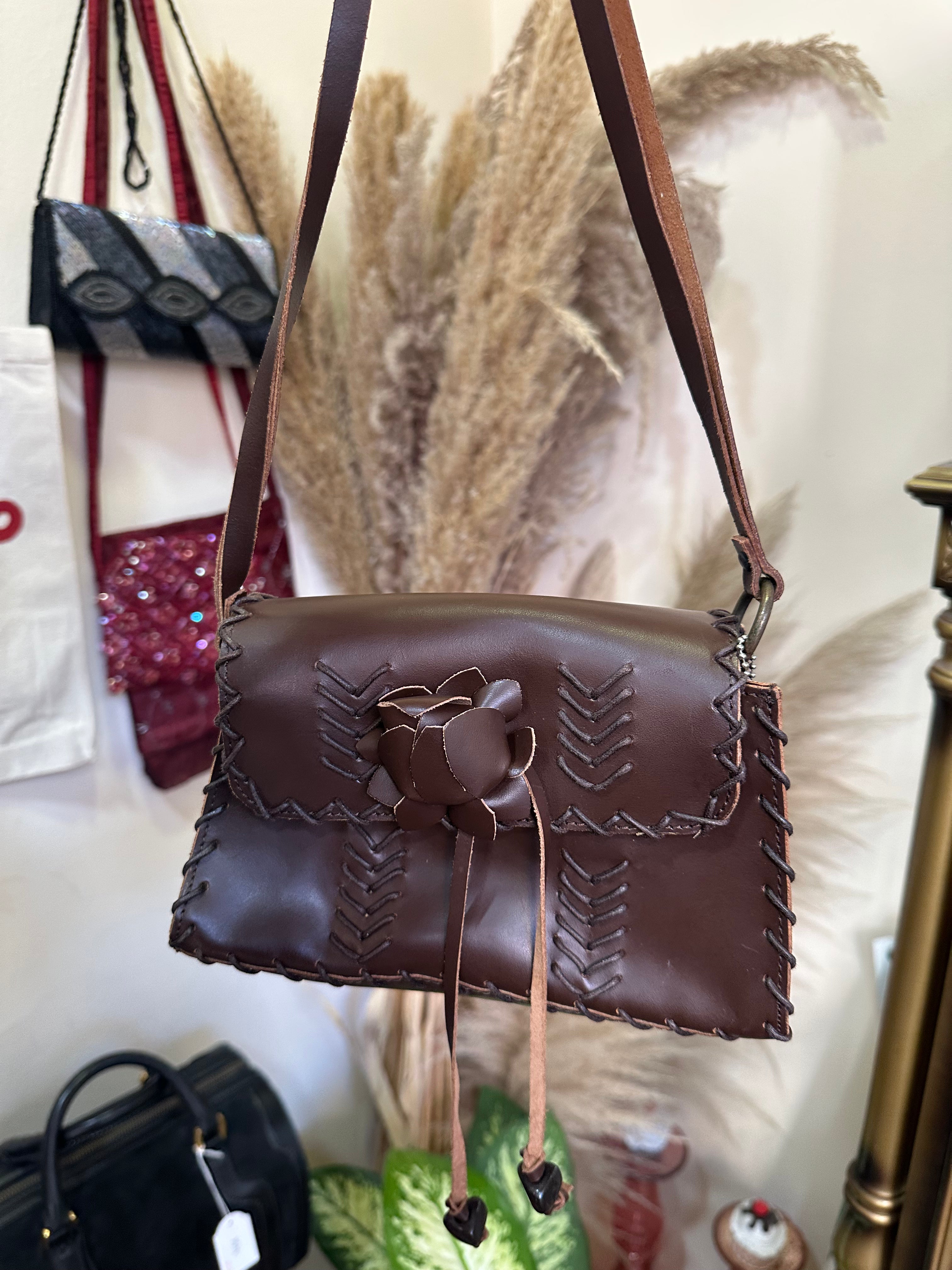 Bacamunda dark brown leather mini cross body bag