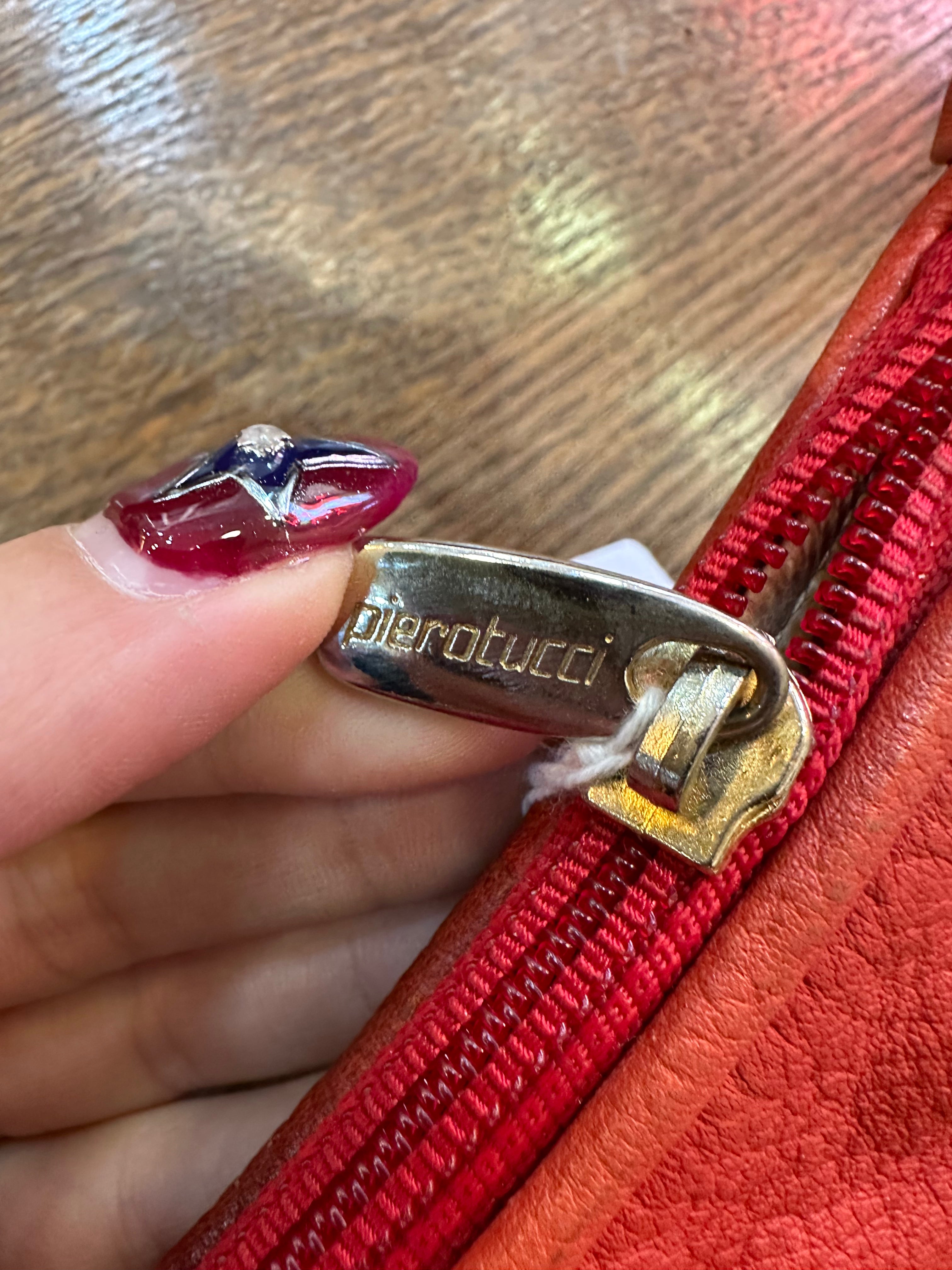 Pierotucci unique vintage orange leather cross body bag