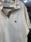 Burberry's woman's beige pique cotton embossed logo polo shirt (XL)