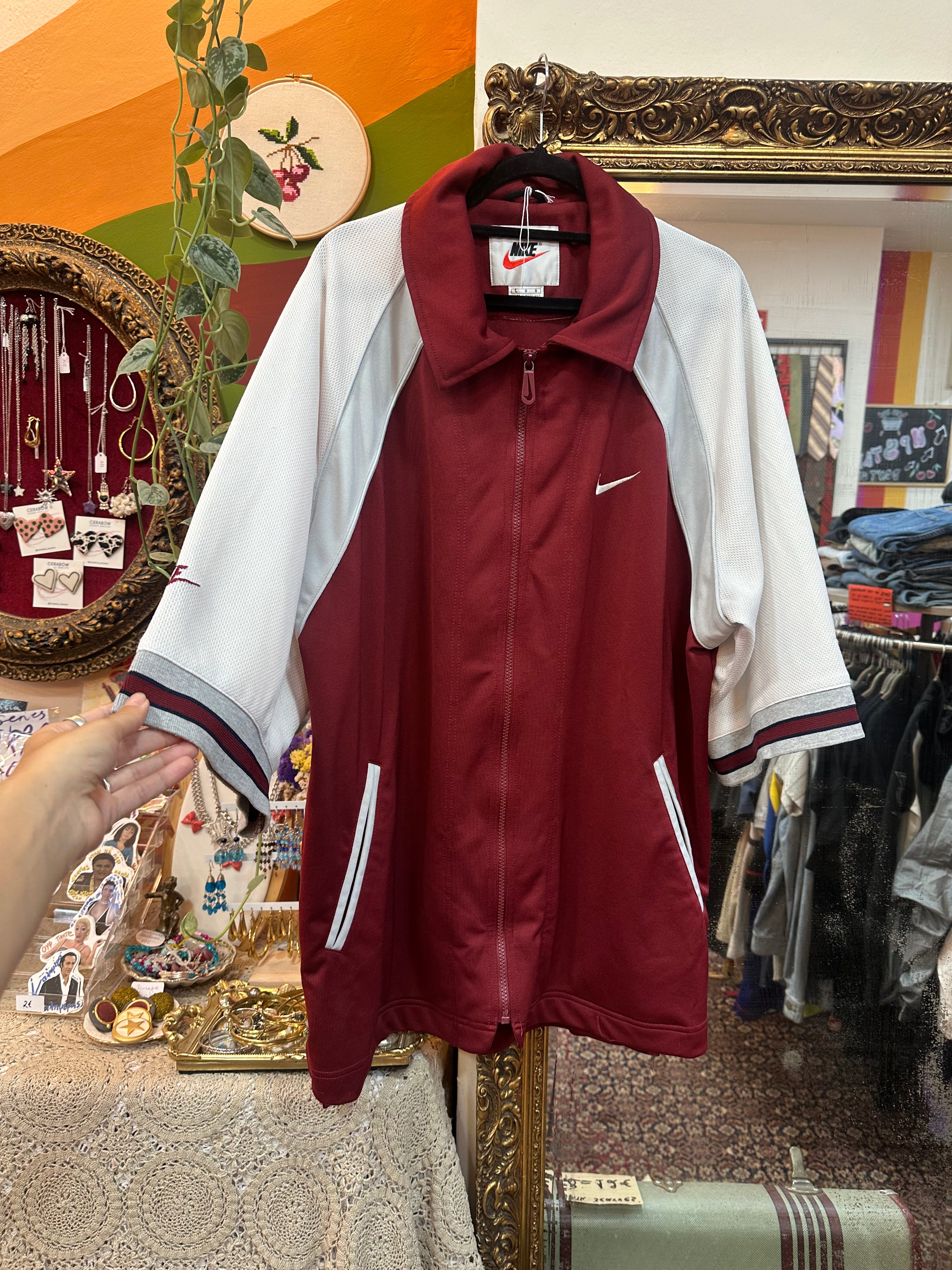 Nike short sleeve track jacket (L)