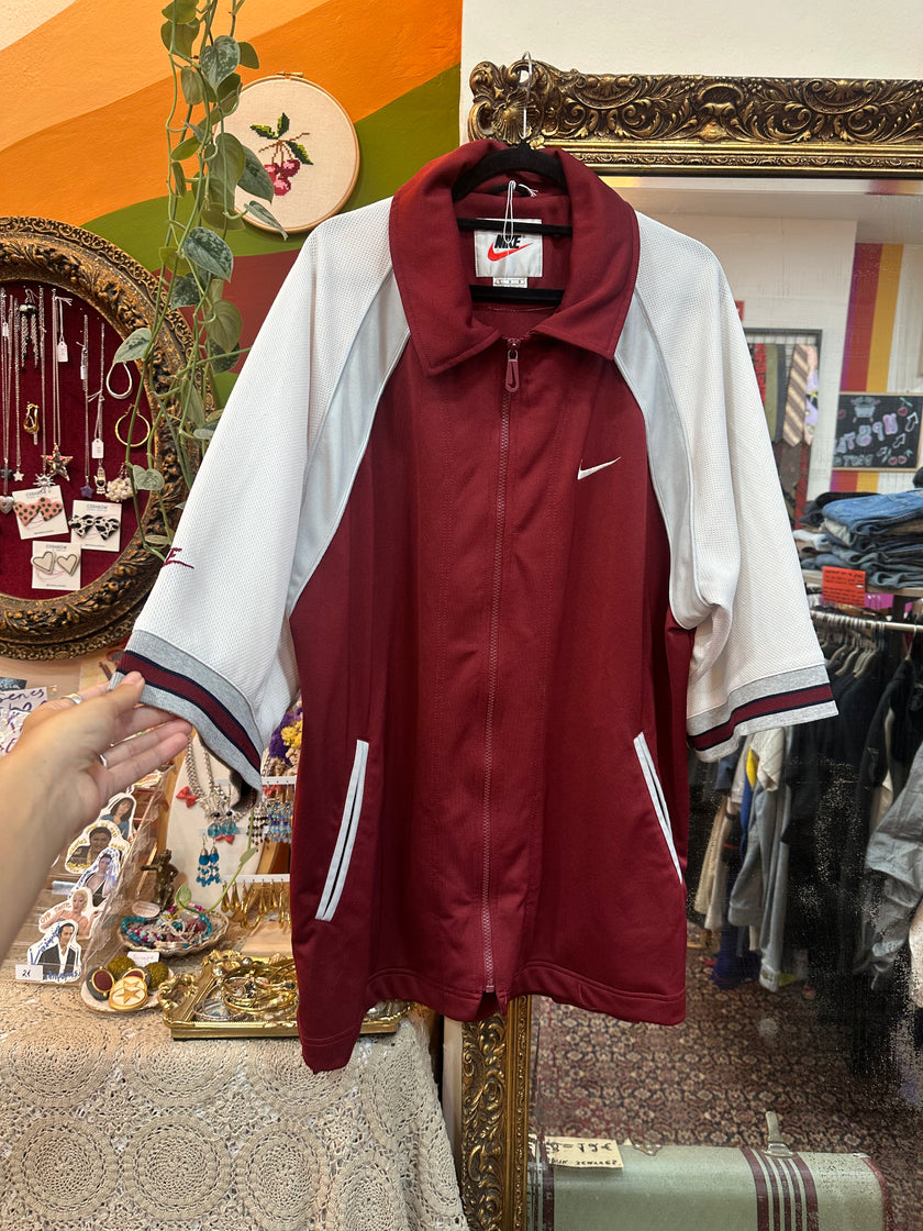 Nike short sleeve track jacket (L)