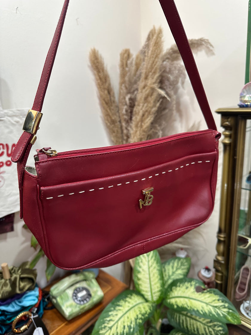 Vintage red leather shoulder bag