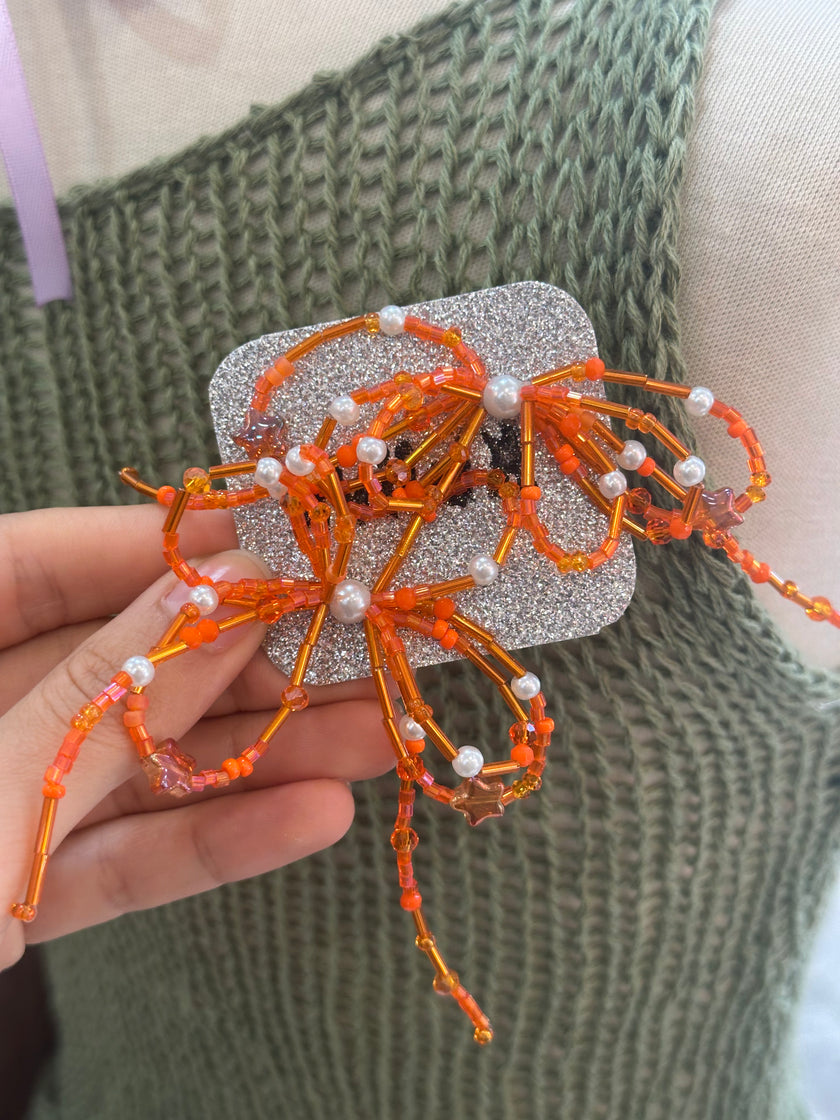 Stunning KRIMA beaded bow earrings