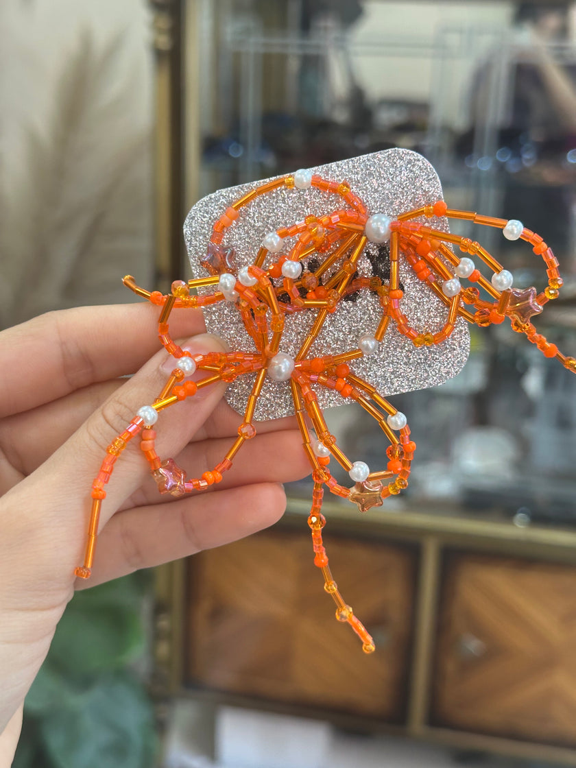 Stunning KRIMA beaded bow earrings