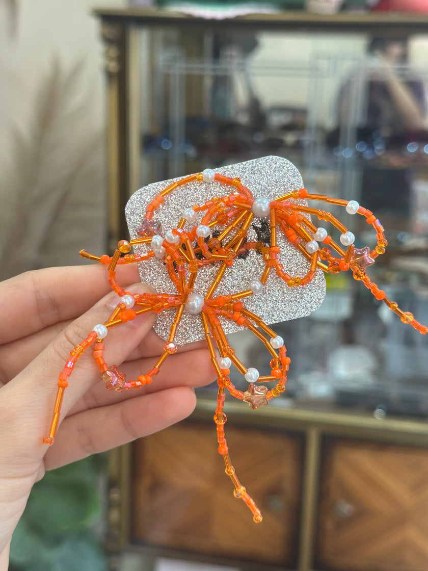 Stunning KRIMA beaded bow earrings