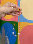 Handmade orange beaded necklace with stars