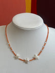 Handmade orange beaded necklace with stars