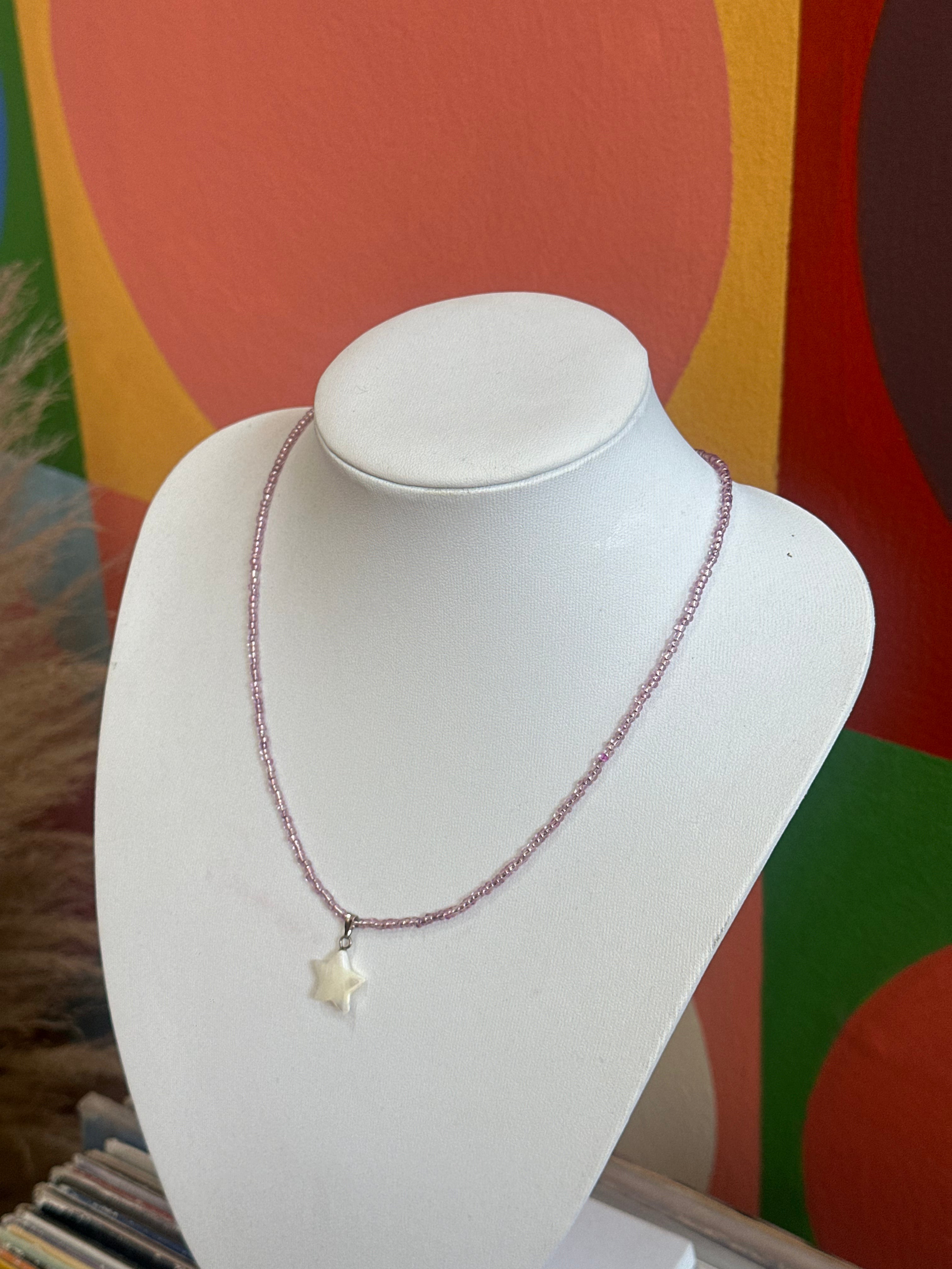 Handmade lavender bead pendant with pearl start