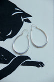 Silver toned brass hoop earrings