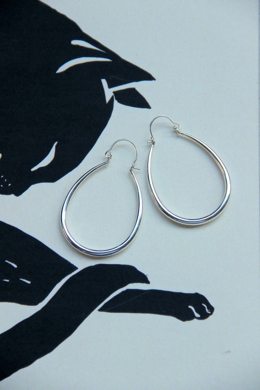 Silver toned brass hoop earrings